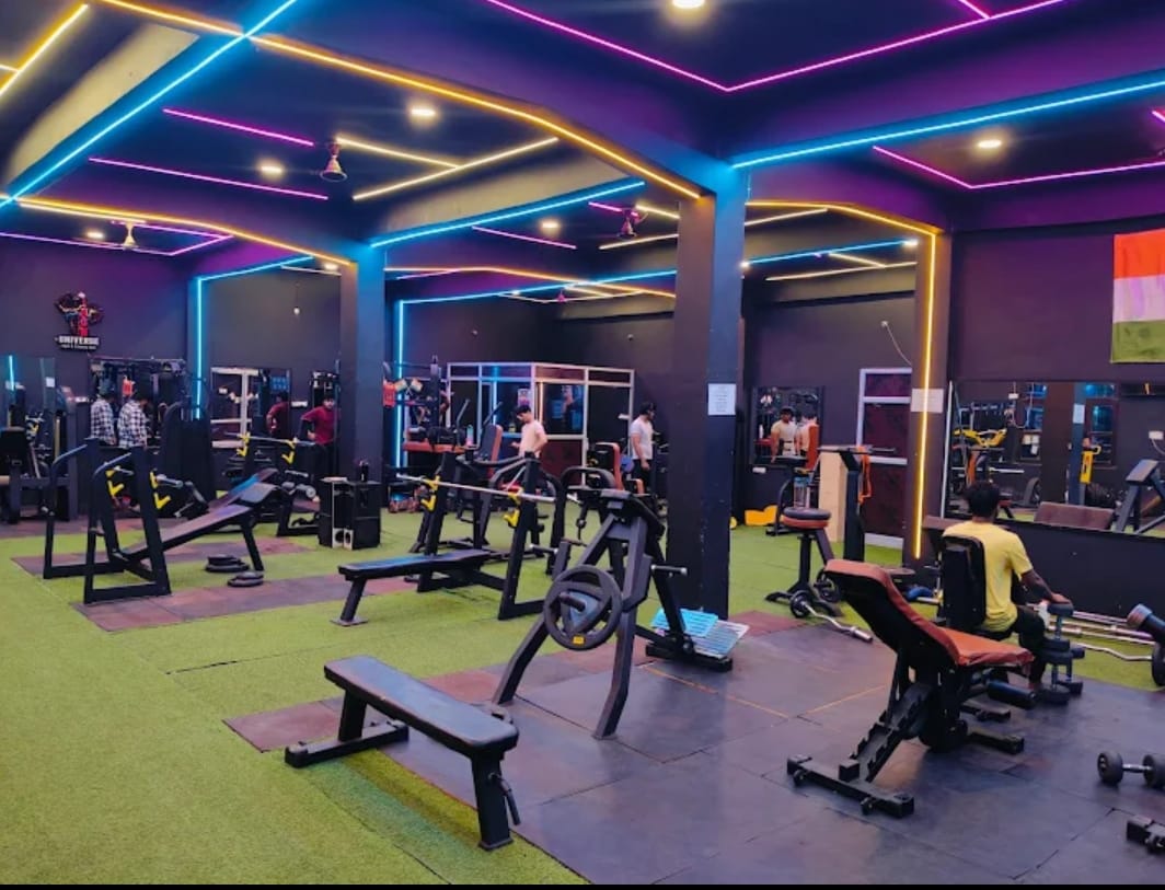 Iron Universe Gym — neon lit interior